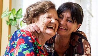 woman hugging her mother